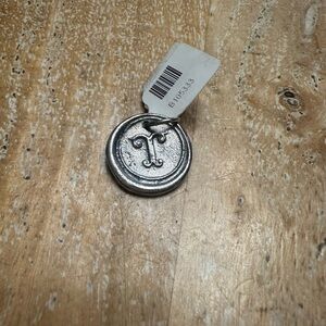 Waxing Poetic Sterling Silver letter T pendant for your necklace.
